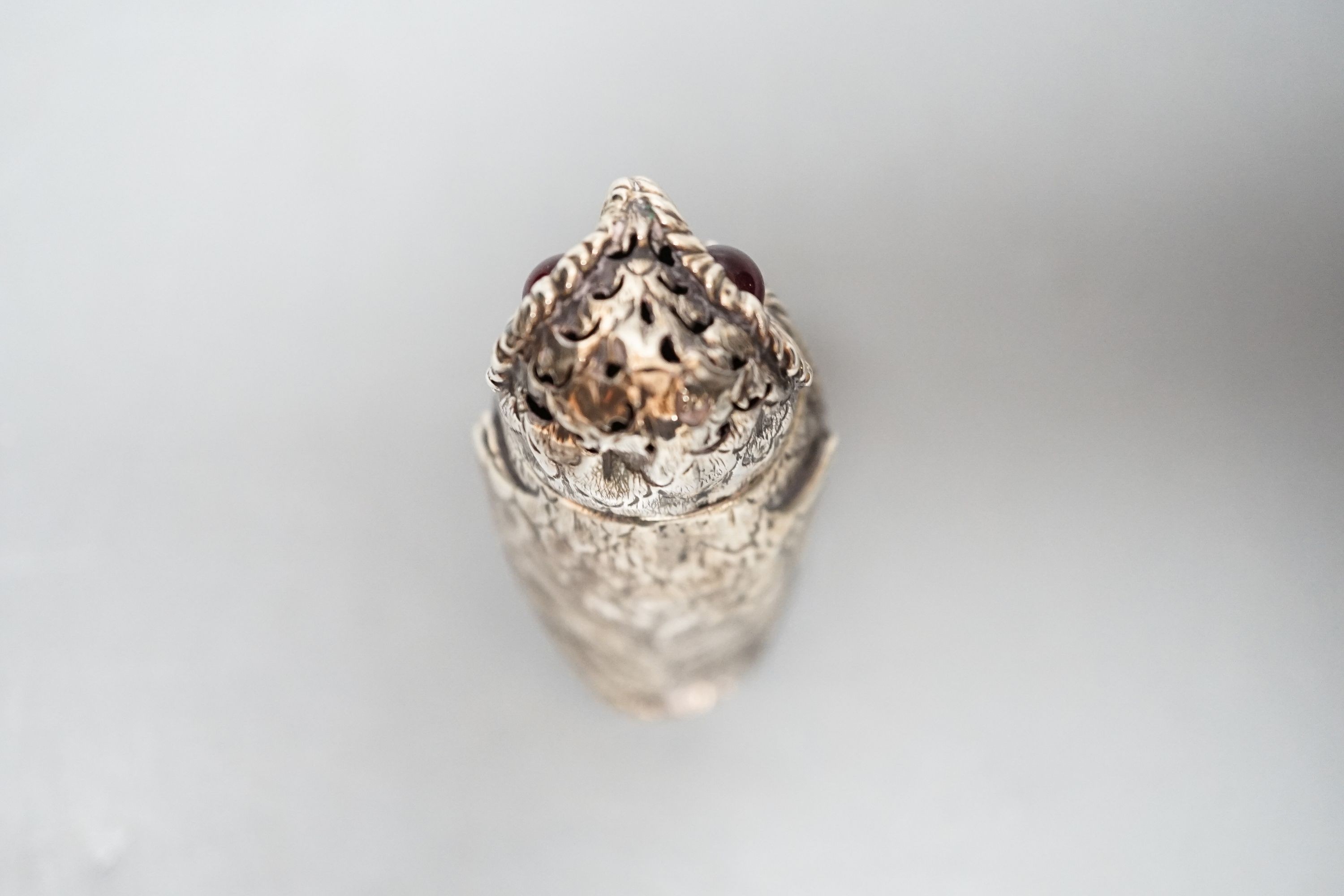A Victorian novelty silver owl pepperette, George John Richards, London, 1850, 74mm, gross 47 grams